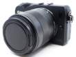 Aparat UŻYWANY Canon EOS M czarny + ob. 18-55 mm IS STM s.n. 034052203866/950201002293 Przód