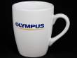  Kubki i koszulki Cyfrowe.pl - kubek porcelanowy z logo Olympus Przód